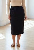 Model wearing Nuggles® 31" Classic Skirt in Black