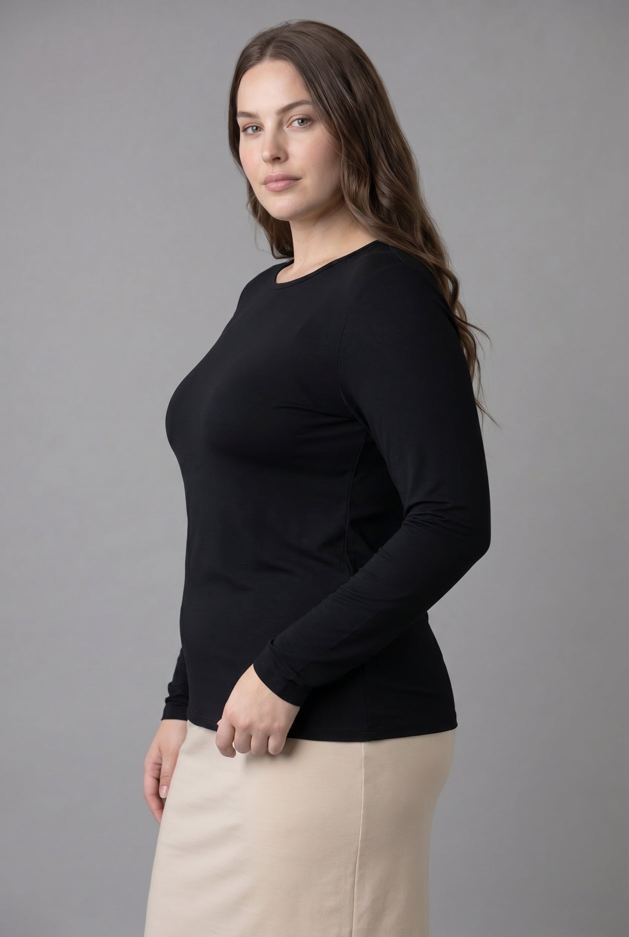 Model wearing Nuggles® Long Sleeve Essential Tee in Black