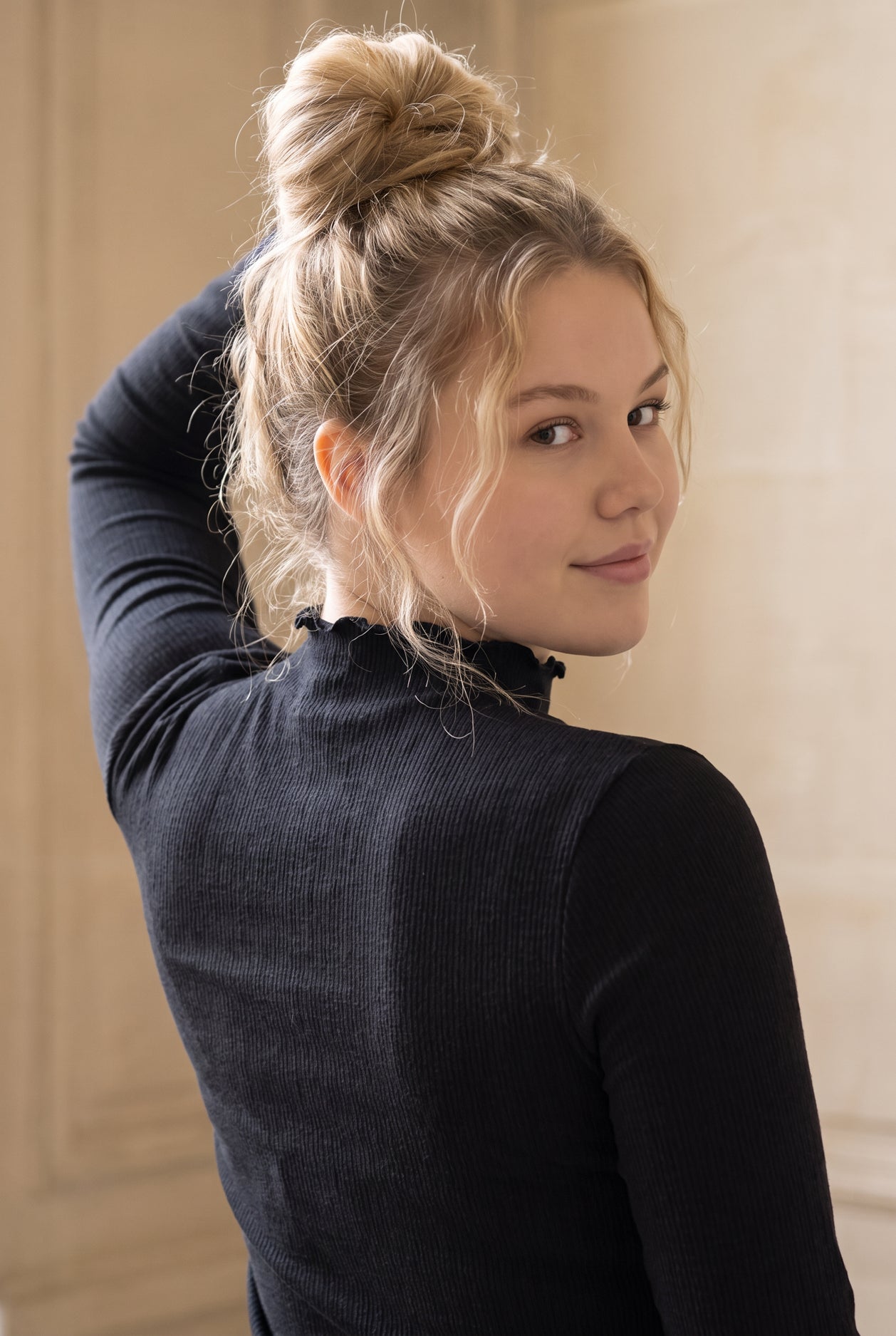 Model wearing Nuggles®  Magnolia Top in Black
