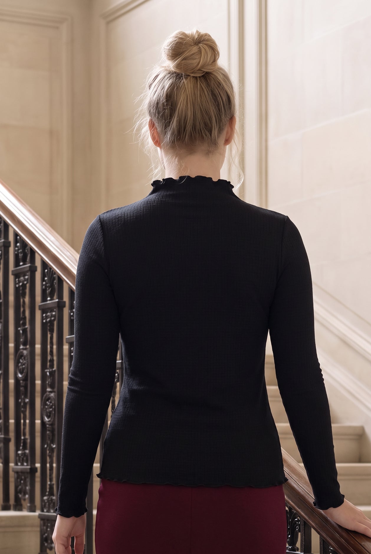 Model wearing Nuggles®  Magnolia Top in Black
