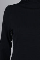 Model wearing Nuggles®  Magnolia Top in Black
