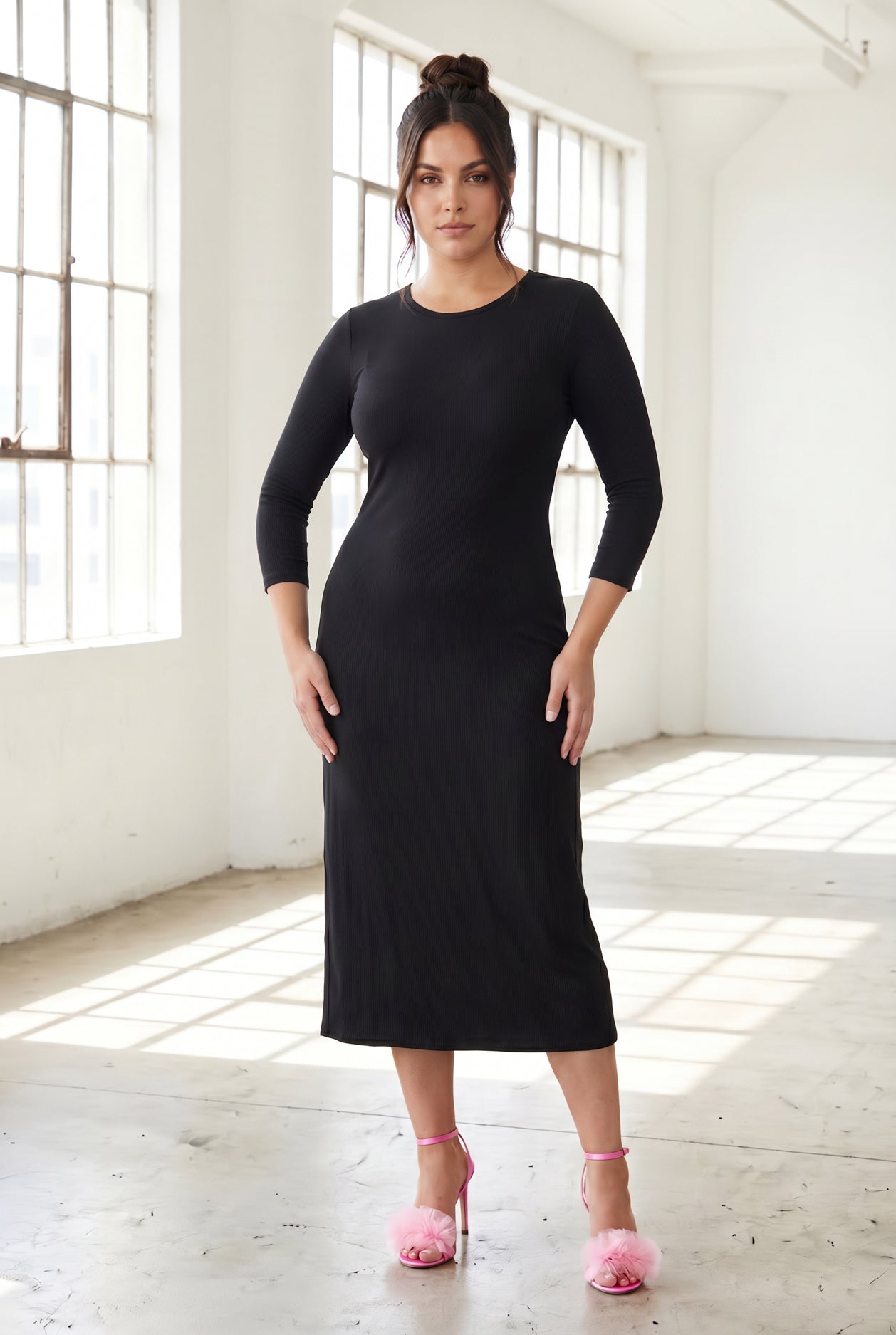 Model wearing Nuggles® Ribbed Midi Layering Dress in Black