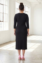 Model wearing Nuggles® Ribbed Midi Layering Dress in Black