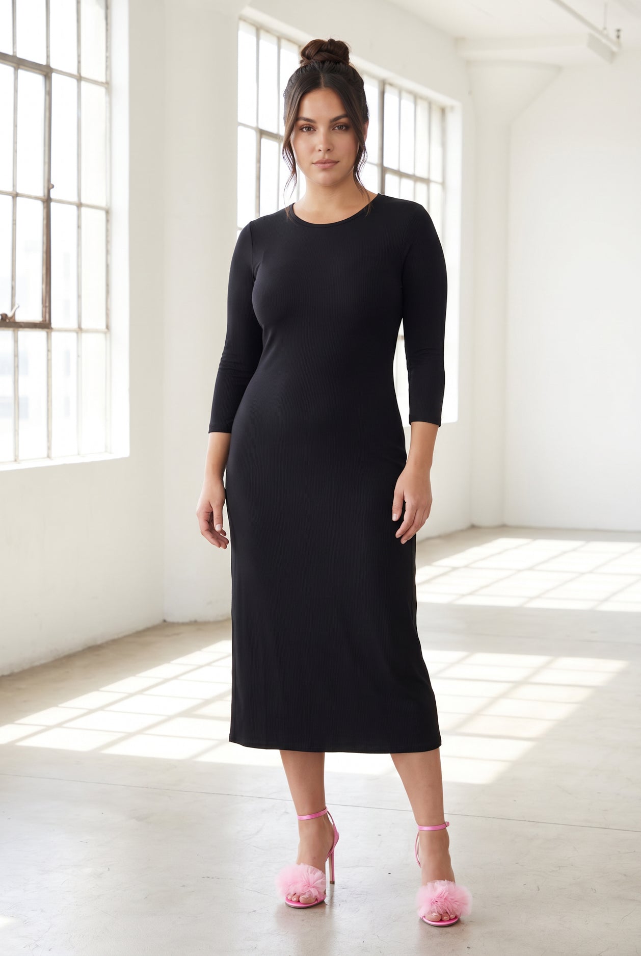 Model wearing Nuggles® Ribbed Midi Layering Dress in Black