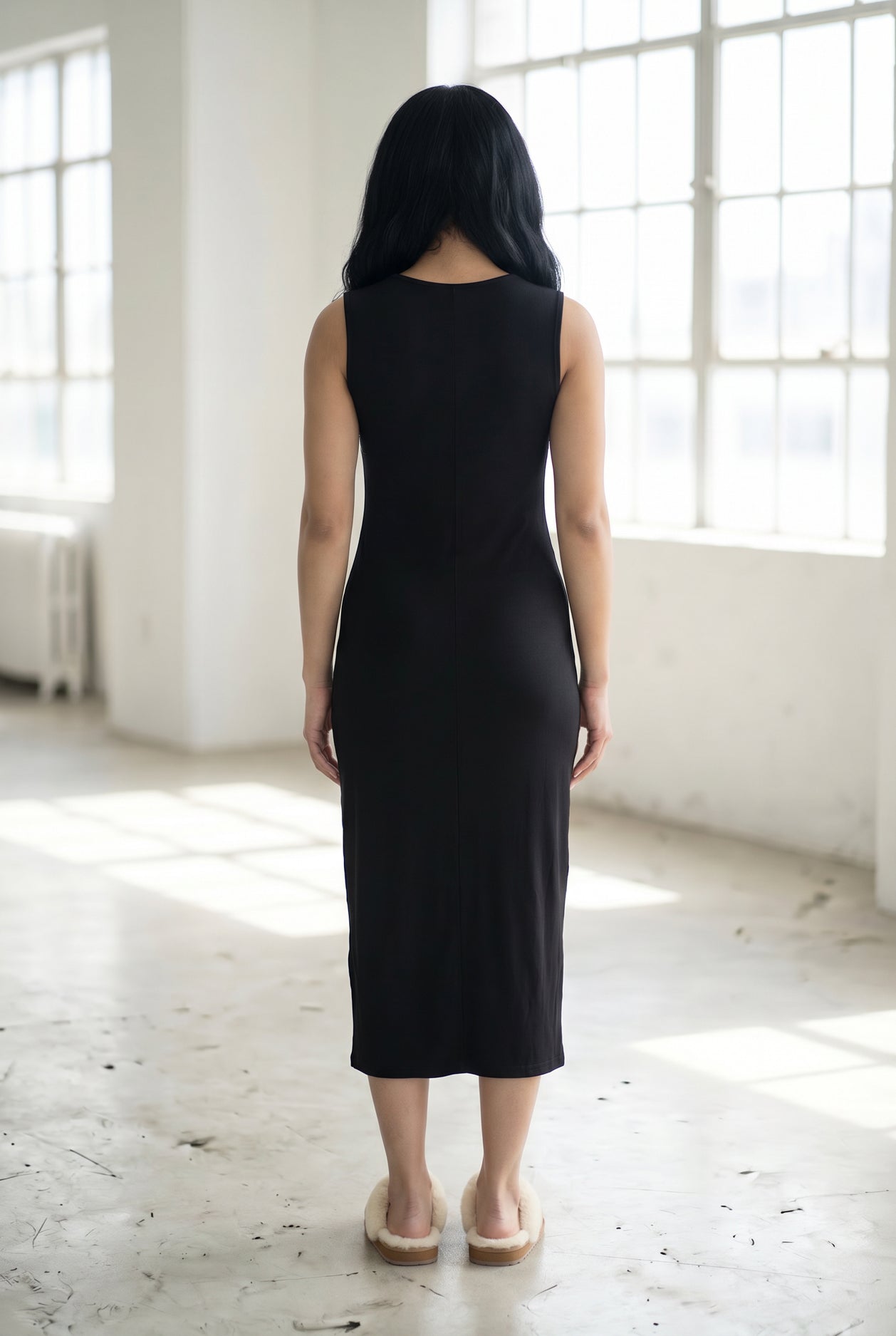 Model wearing Nuggles® Tank Midi Dress in Black