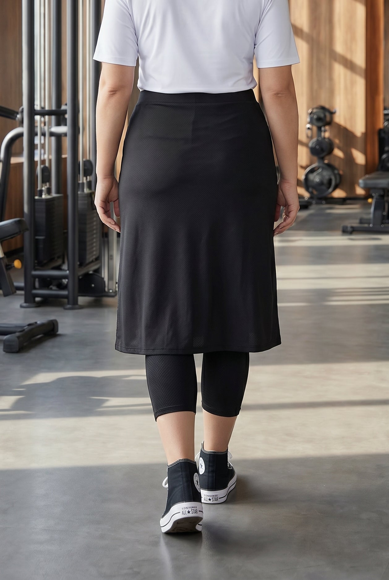 Model wearing Nuggles® 27" All-Sport Skirt in Black