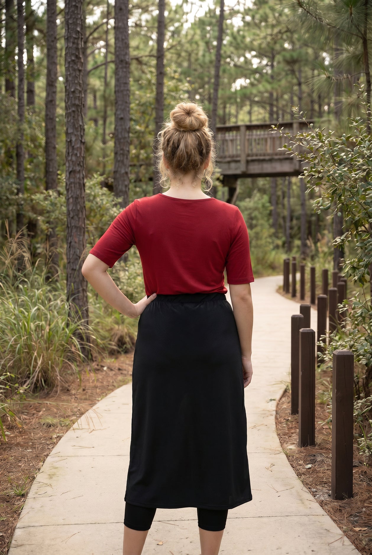 Model wearing Nuggles® 31" All-Sport Skirt in Black