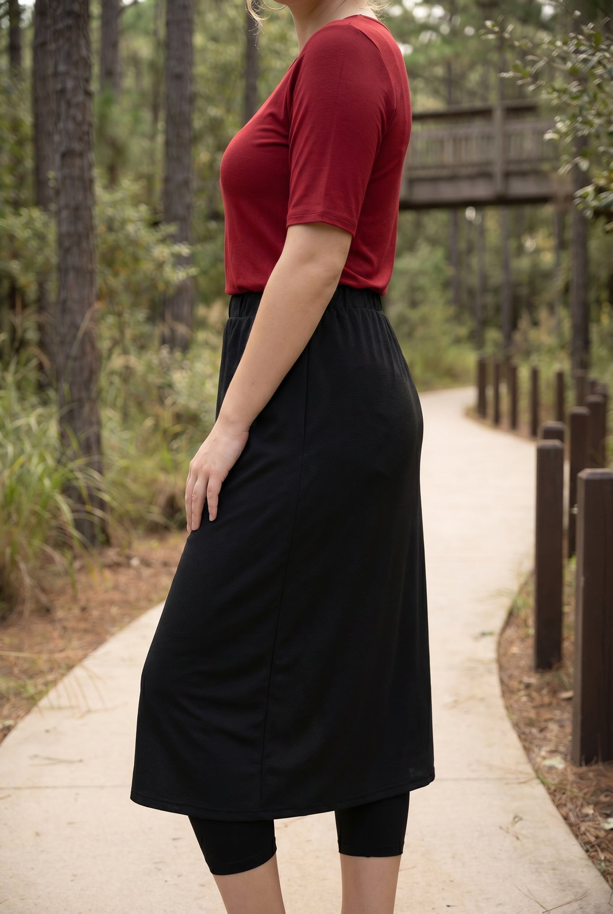 Model wearing Nuggles® 31" All-Sport Skirt in Black