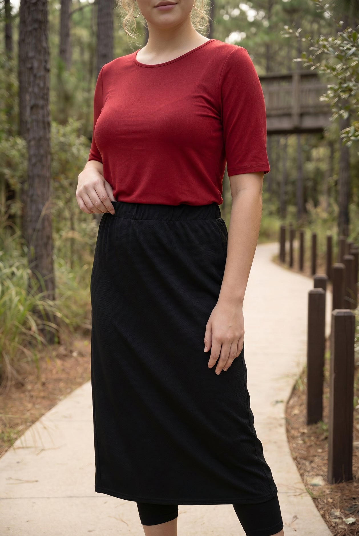 Model wearing Nuggles® 31" All-Sport Skirt in Black