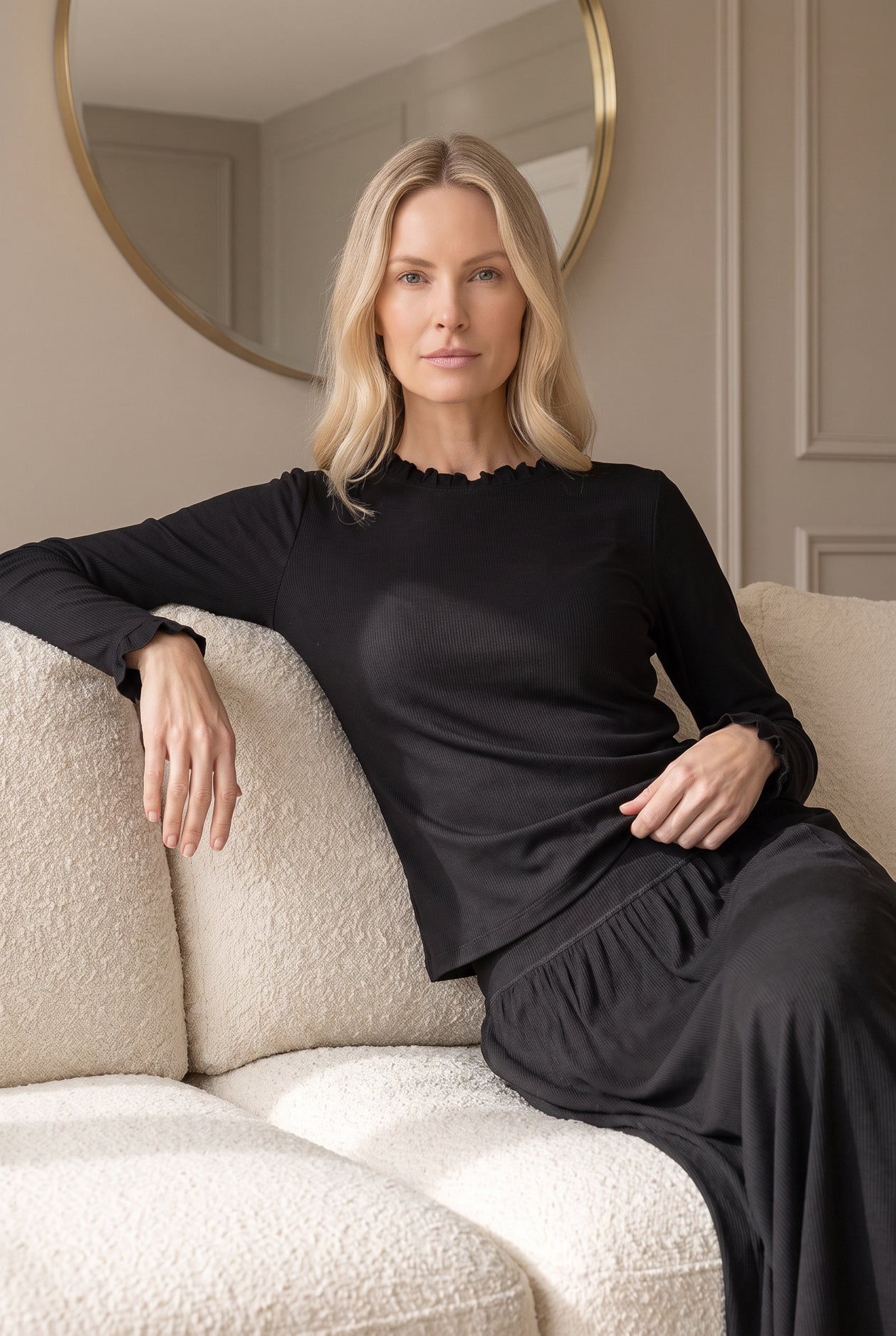 Model wearing Nuggles®  Bethany Shirt & Skirt in Black