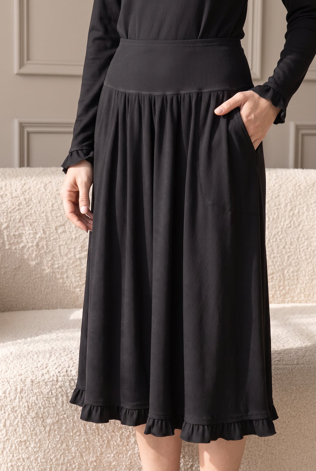 Model wearing Nuggles®  Bethany Shirt & Skirt in Black