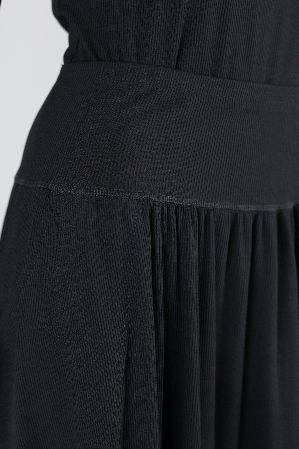 Model wearing Nuggles®  Bethany Shirt & Skirt in Black