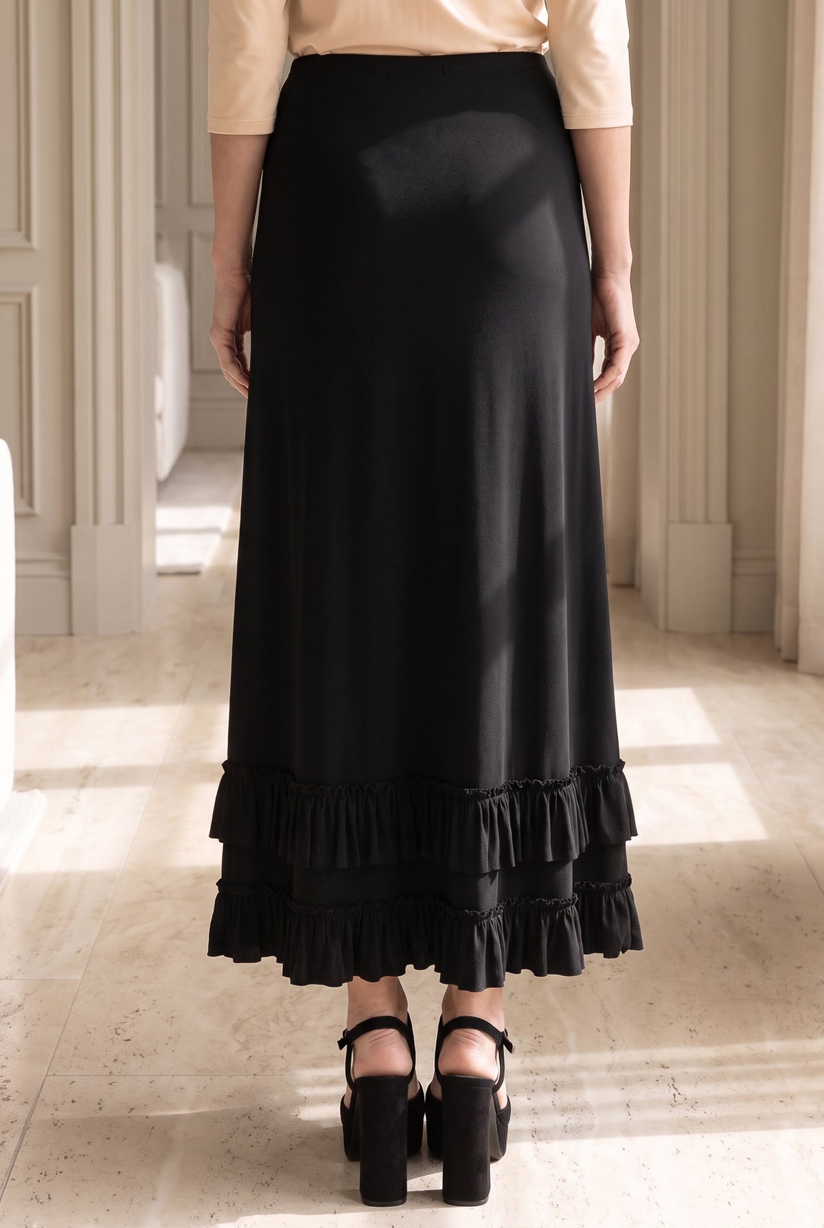 Model wearing Nuggles®  Callie Skirt in Black