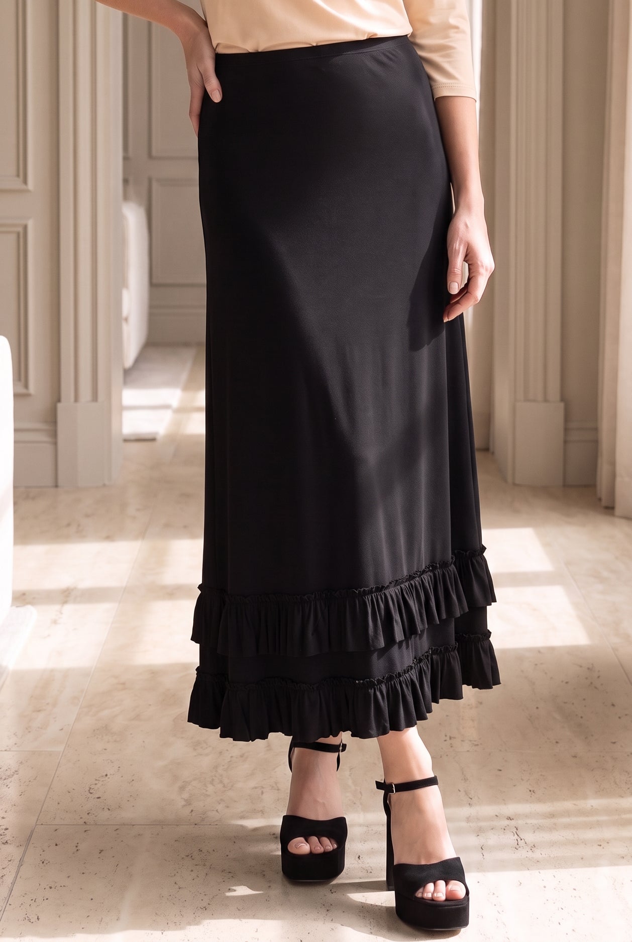 Model wearing Nuggles®  Callie Skirt in Black