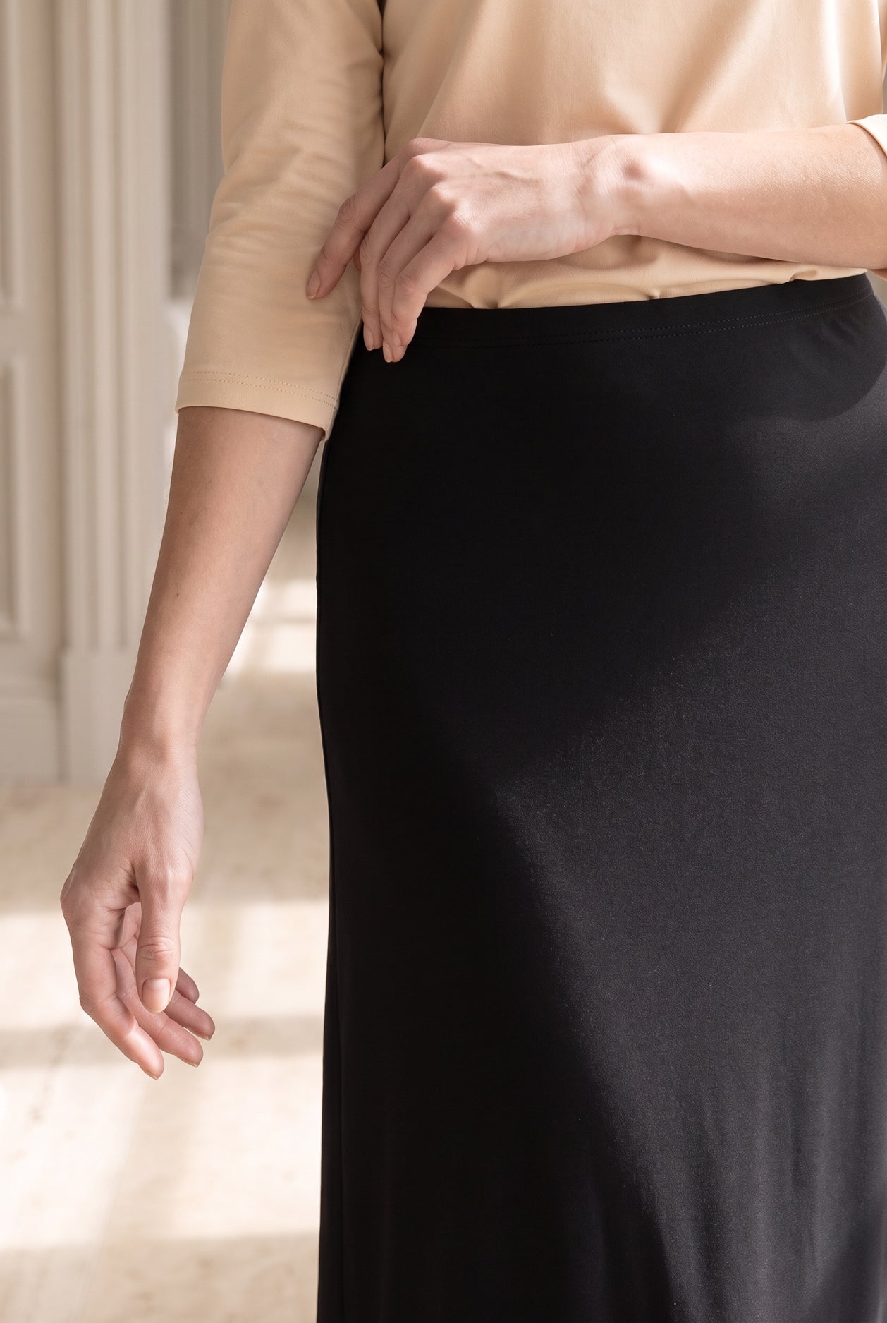 Model wearing Nuggles®  Callie Skirt in Black