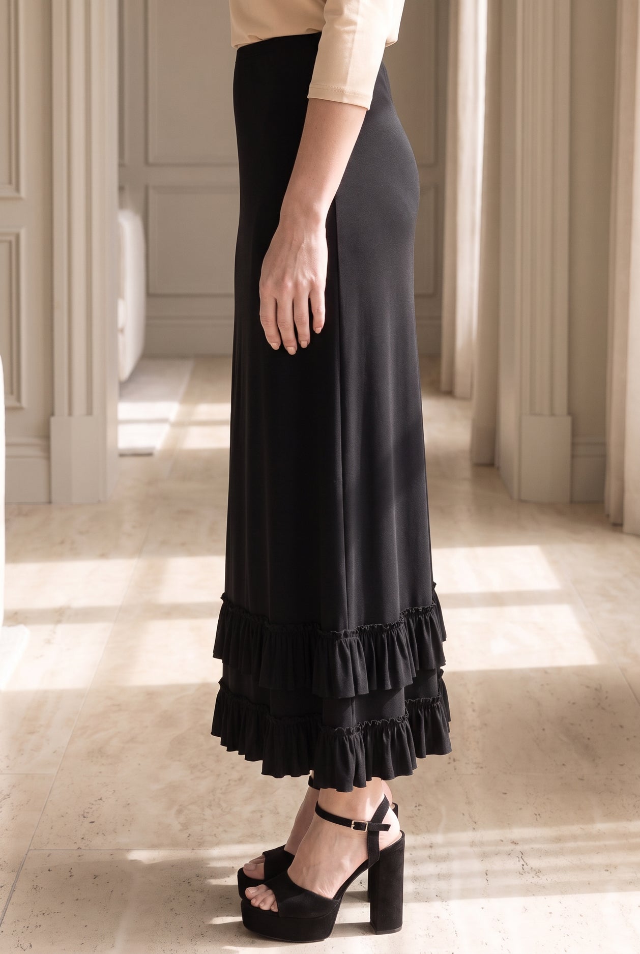Model wearing Nuggles®  Callie Skirt in Black