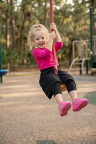 Model wearing Nuggles® Girls All-Sport Skirt in Black
