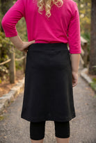 Model wearing Nuggles® Girls All-Sport Skirt in Black