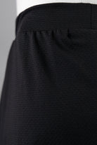 Model wearing Nuggles® Girls All-Sport Skirt in Black