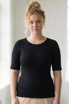 Model wearing the Nuggles® Essential Half Sleeve Tee in Black