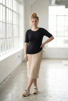 Model wearing the Nuggles® Essential Half Sleeve Tee in Black