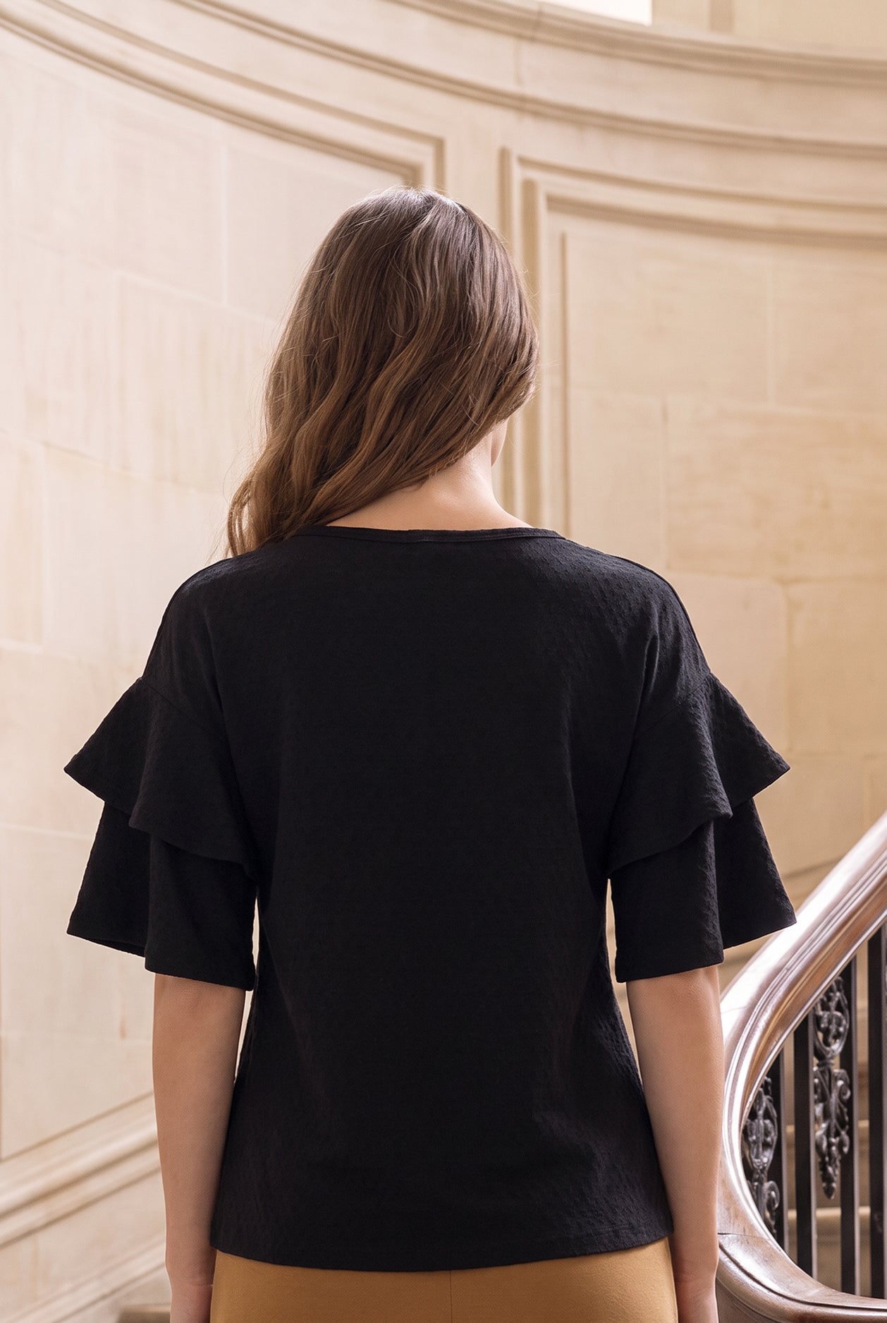 Model wearing Nuggles®  Helena Top in Black