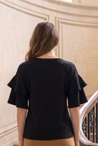 Model wearing Nuggles®  Helena Top in Black