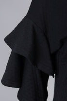 Model wearing Nuggles®  Helena Top in Black