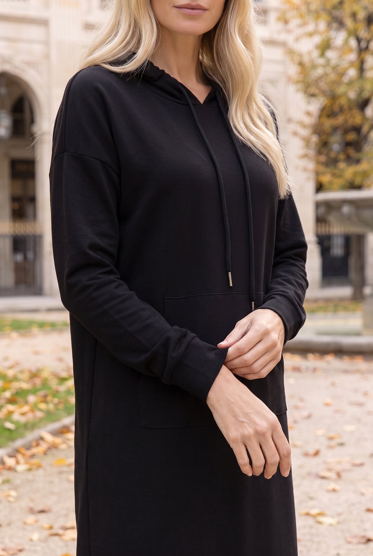 Model wearing Nuggles®   Hoodie Dress in Black
