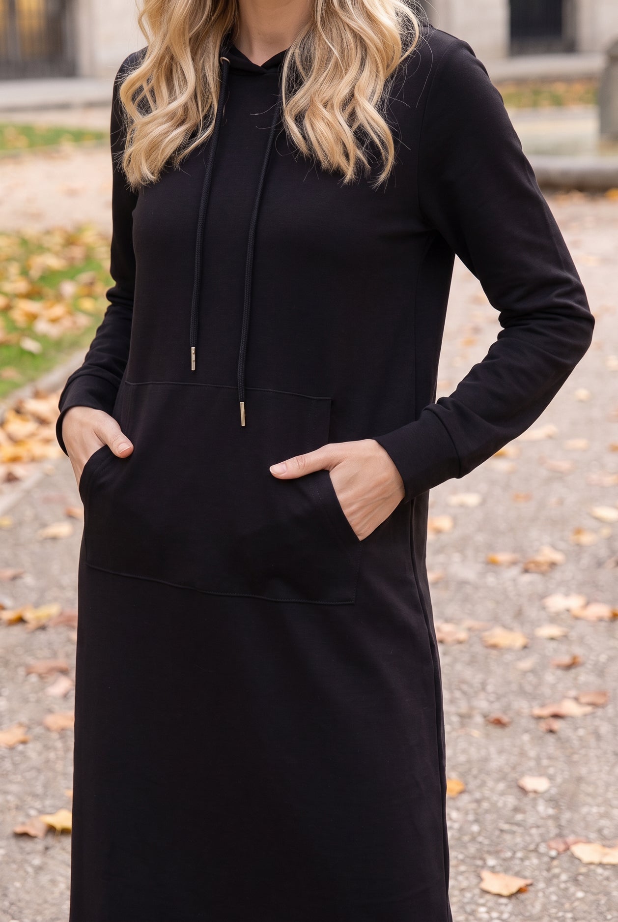 Model wearing Nuggles®   Hoodie Dress in Black