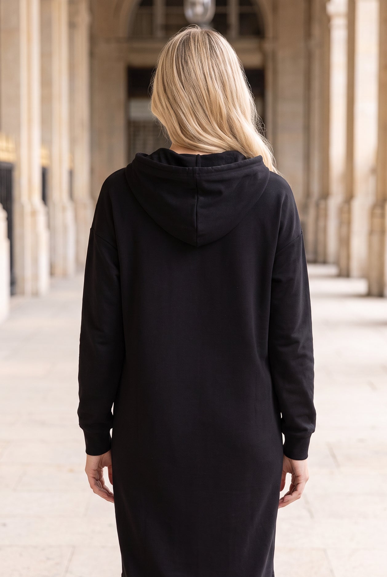 Model wearing Nuggles®   Hoodie Dress in Black