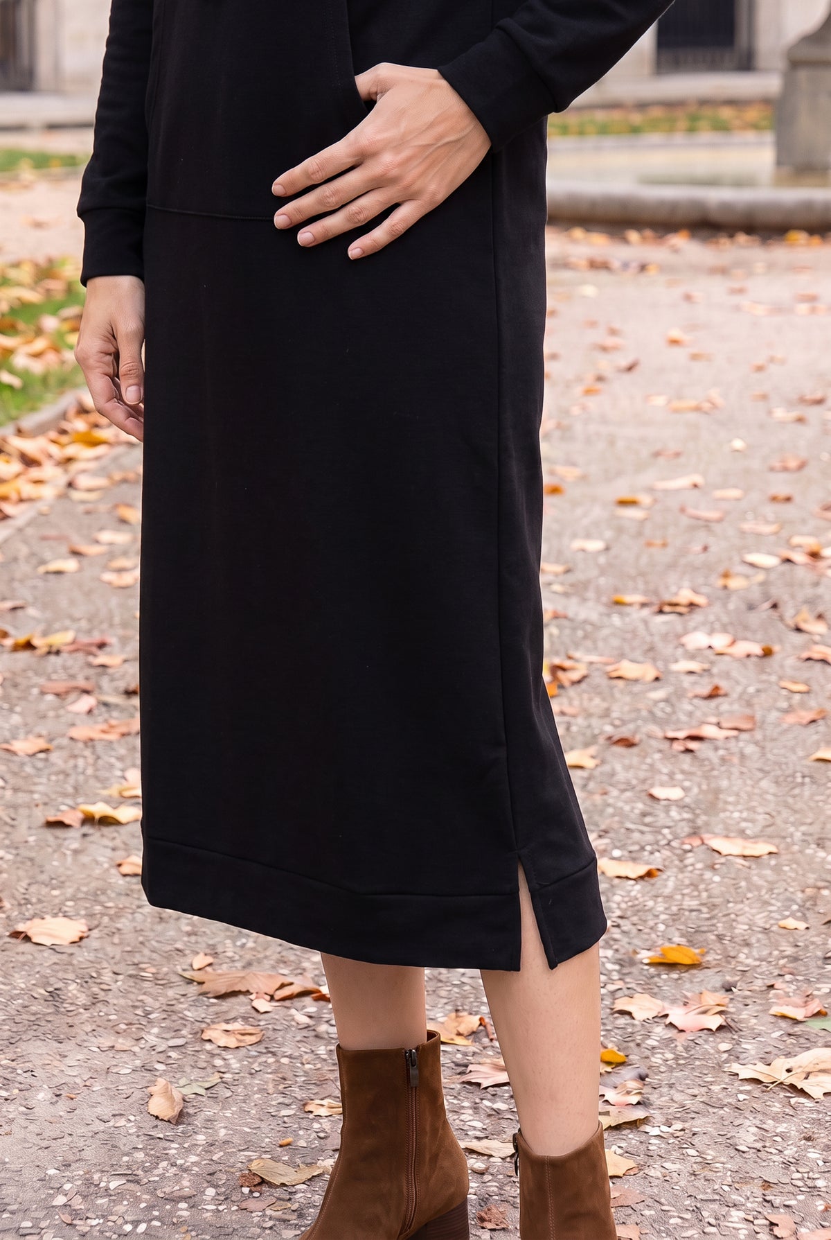 Model wearing Nuggles®   Hoodie Dress in Black
