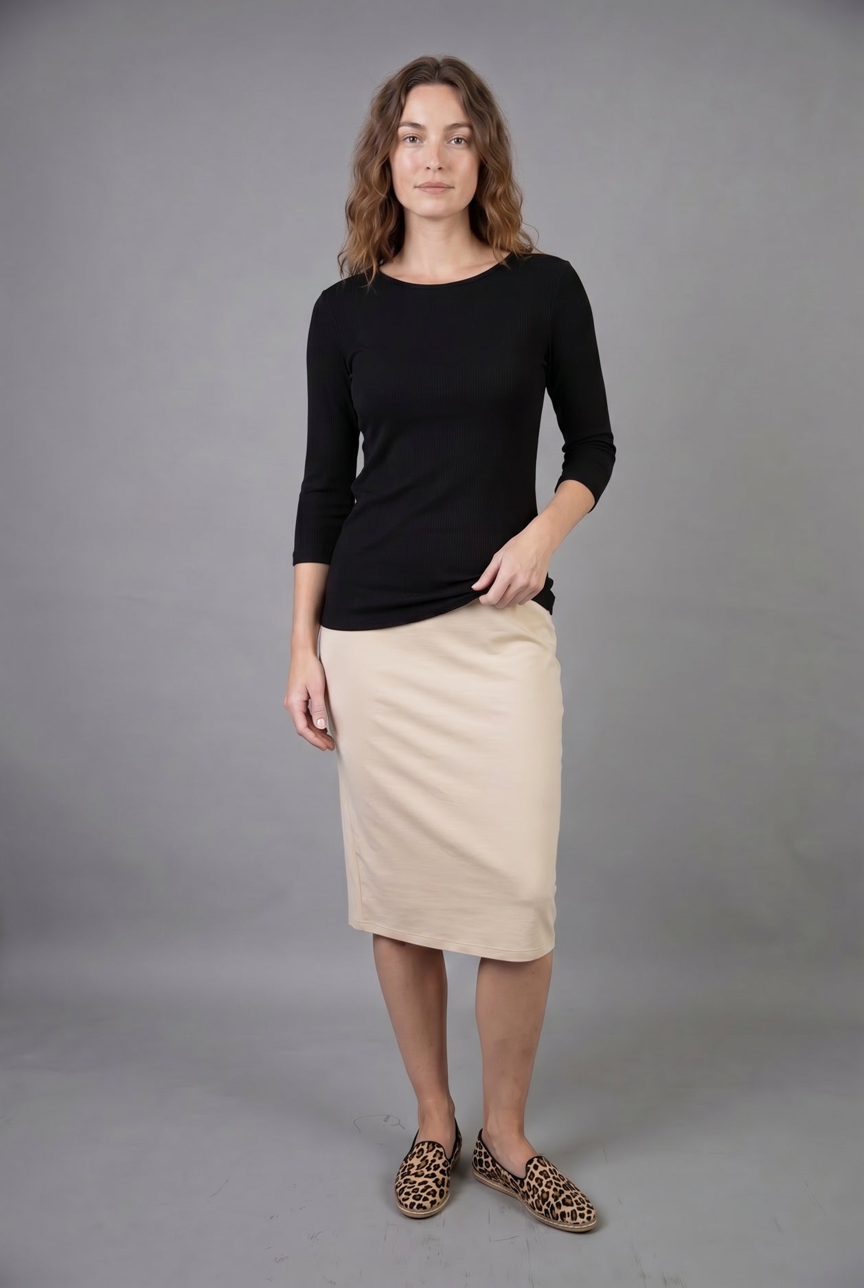 Model wearing Nuggles® 3/4 Essential Ribbed Tee in Black