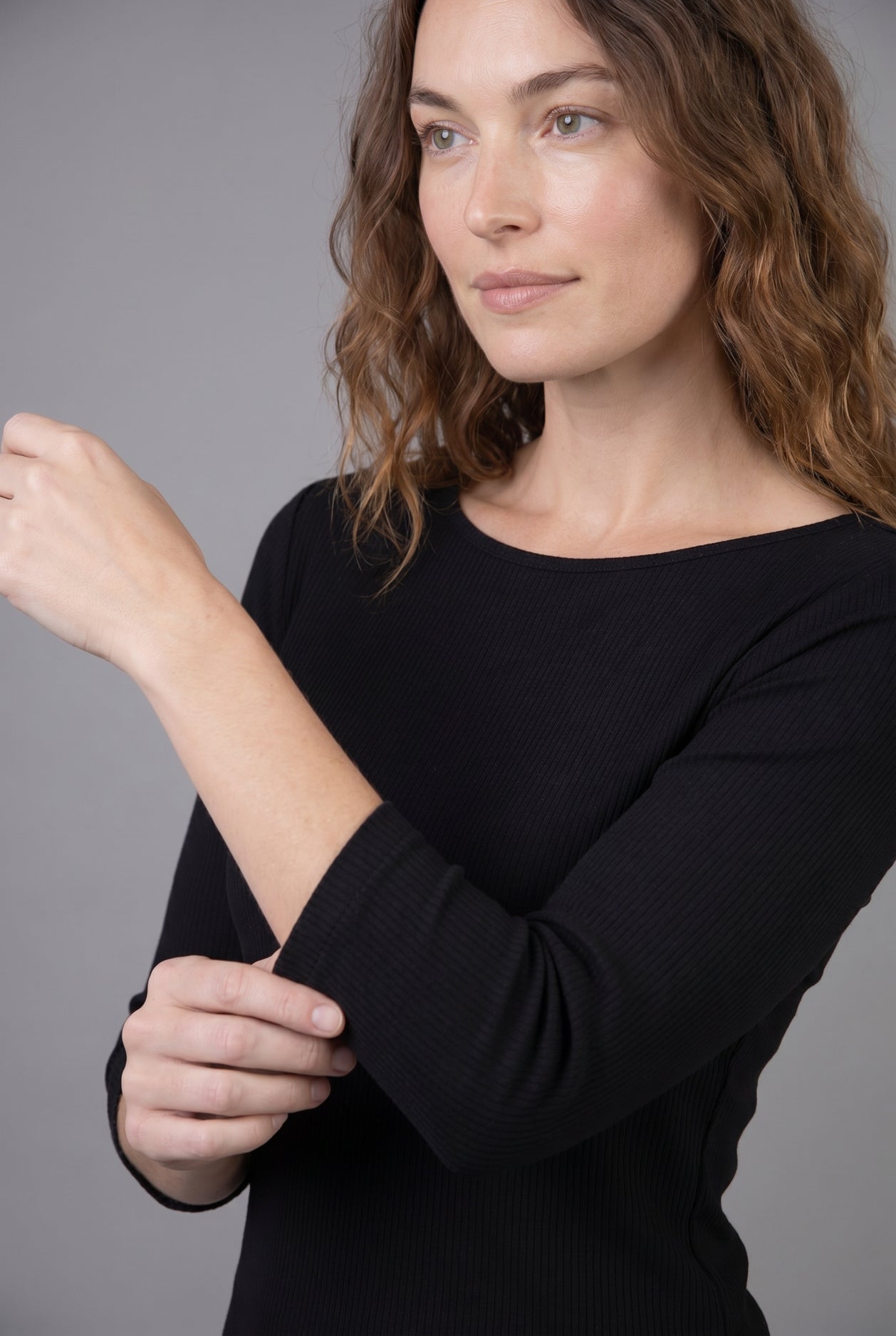Model wearing Nuggles® 3/4 Essential Ribbed Tee in Black