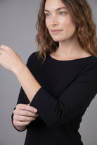 Model wearing Nuggles® 3/4 Essential Ribbed Tee in Black