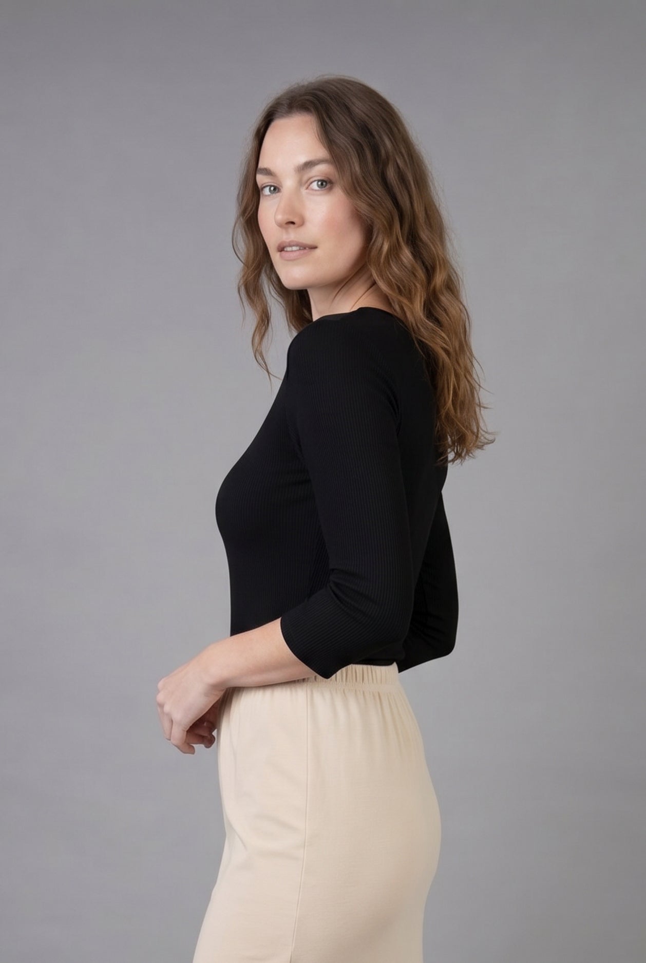 Model wearing Nuggles® 3/4 Essential Ribbed Tee in Black