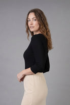 Model wearing Nuggles® 3/4 Essential Ribbed Tee in Black