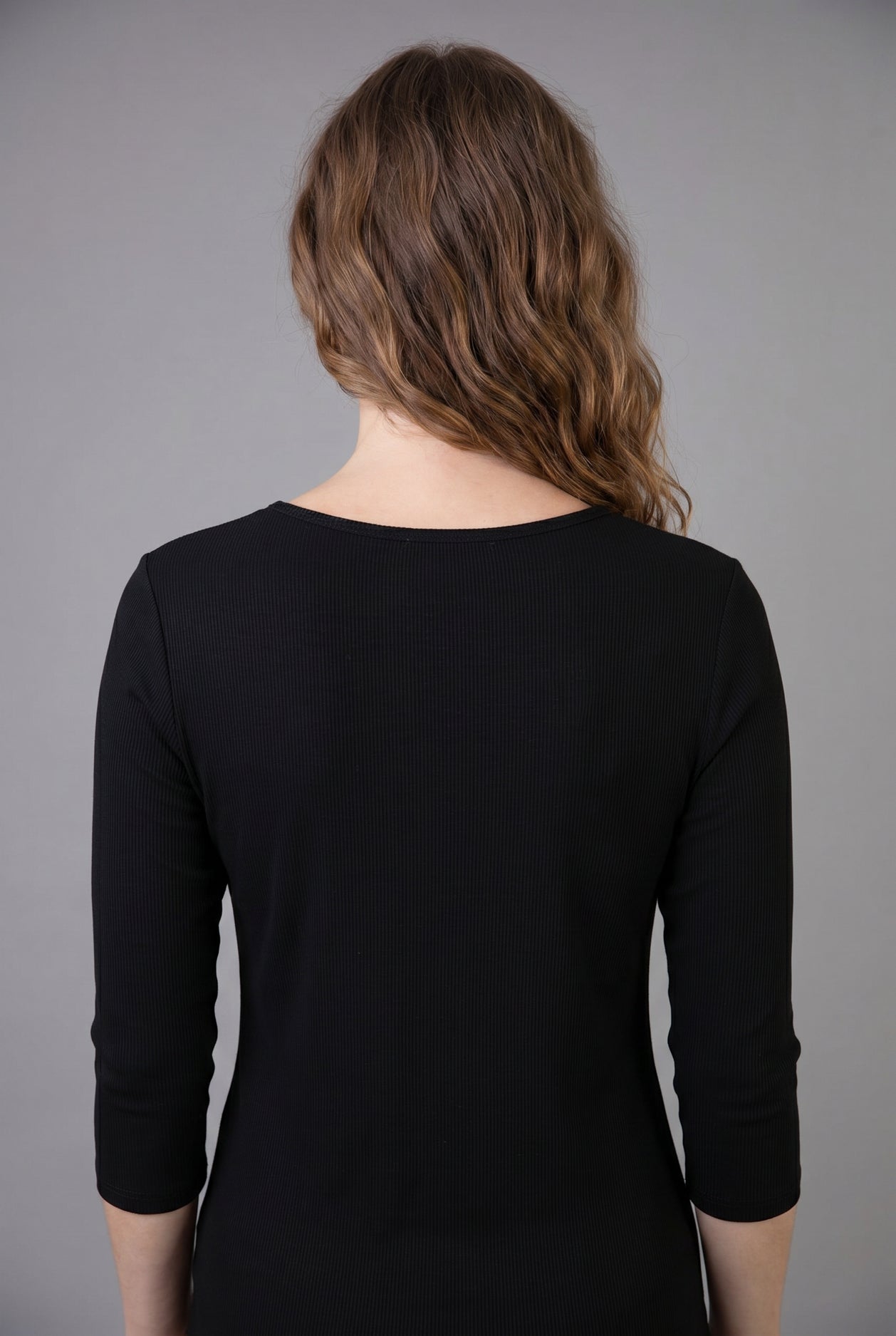 Model wearing Nuggles® 3/4 Essential Ribbed Tee in Black