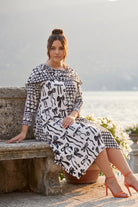 The Nuggles® Bailey Dress in Black Ribbon midi length, two tone with cowl neckline