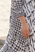 The Nuggles® Bailey Dress in Black Ribbon midi length, two tone with cowl neckline