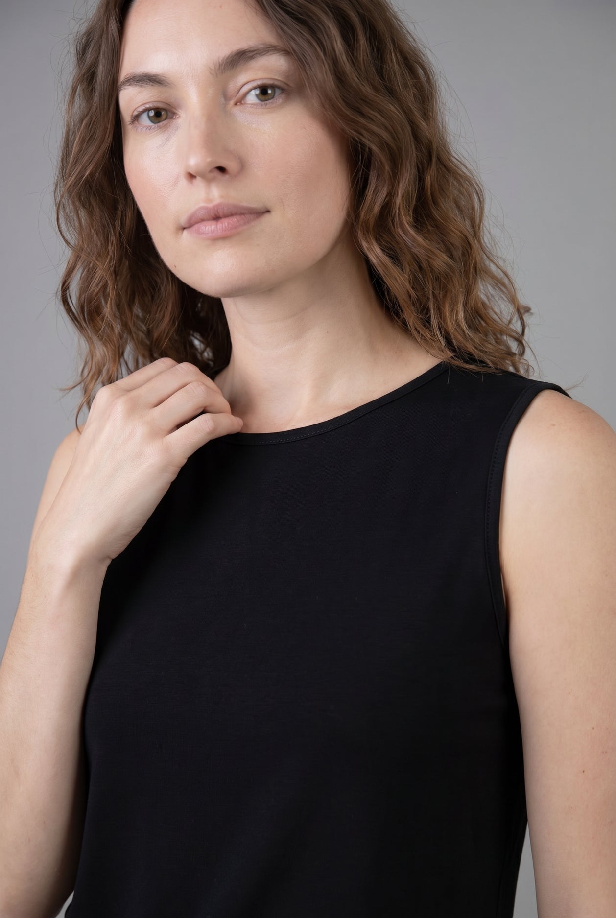 Model wearing Nuggles® Essential Tank in Black