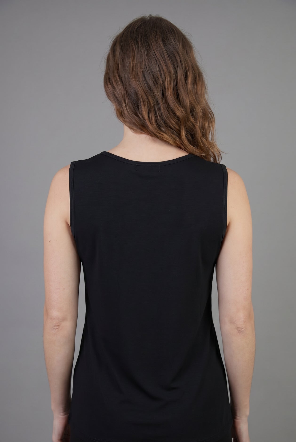 Model wearing Nuggles® Essential Tank in Black