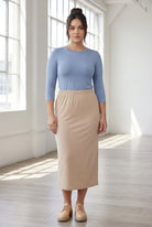 Model wearing Nuggles® 3/4 Essential Tee in Blue Pearl