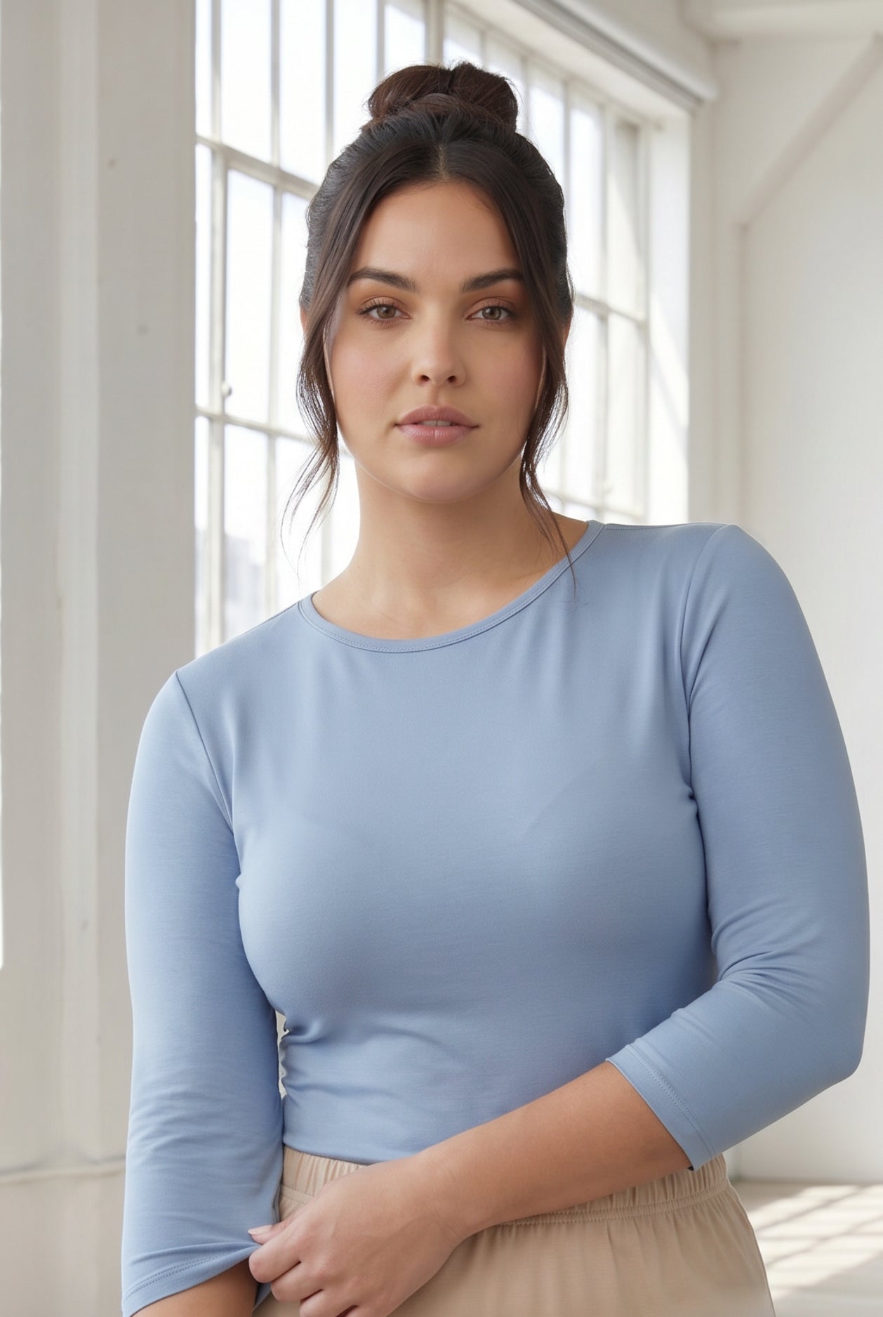 Model wearing Nuggles® 3/4 Essential Tee in Blue Pearl