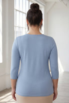 Model wearing Nuggles® 3/4 Essential Tee in Blue Pearl