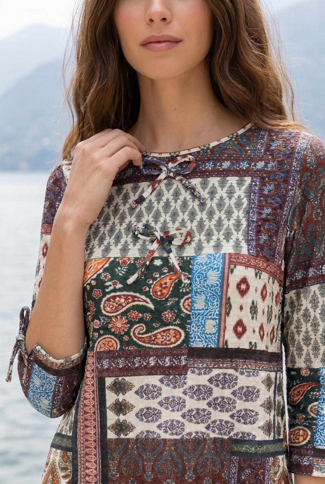 Model wearing Nuggles® Lexi Bow Top in Boho Patchwork