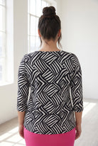 Model wearing Nuggles® 3/4 Essential Tee in Bold Lines