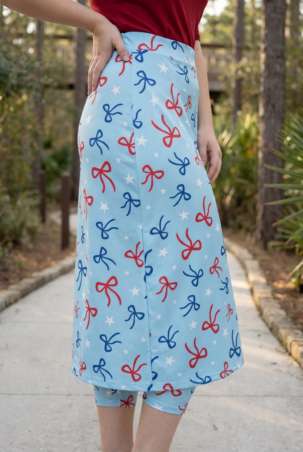 Model wearing Nuggles® 31" All-Sport Skirt in Bow Active