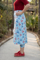 Model wearing Nuggles® 31" All-Sport Skirt in Bow Active