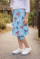 Model wearing Nuggles® Girls All-Sport Skirt in Bow Active